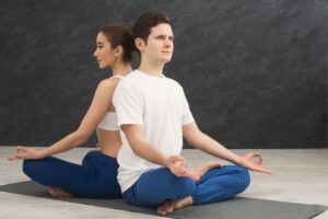 Back-to-back Seated Meditation - A 2 person yoga posee