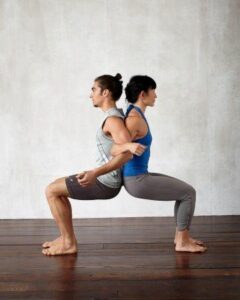 Revolved chair for 2 person yoga pose